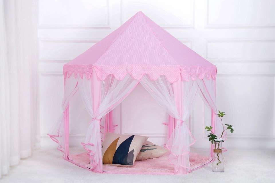 A beautiful barbie tent is in the house