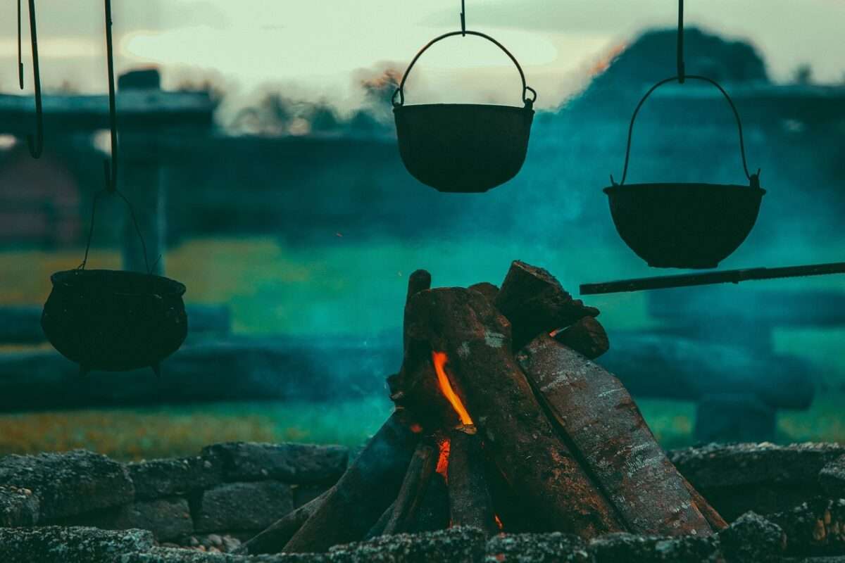 Enjoying bone fire while camping