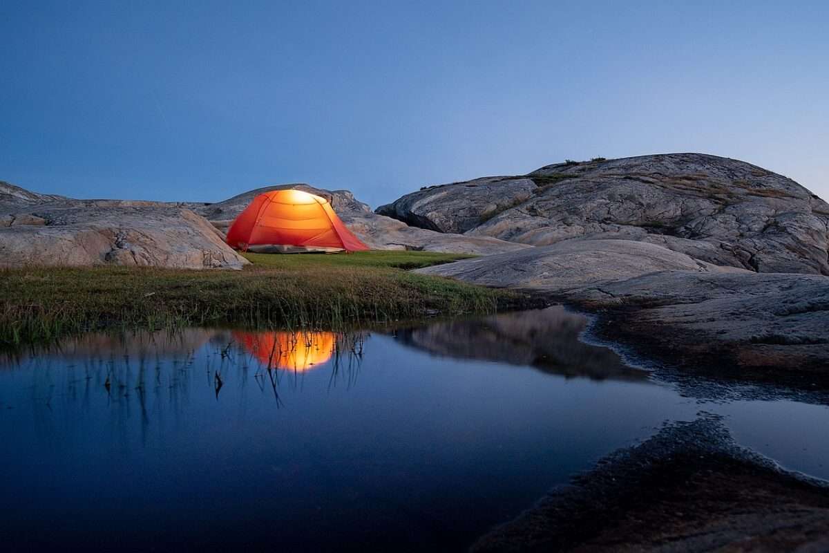 a beautiful view of sunset while tent camping