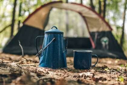 camp and tea pot in the middle of the jungle